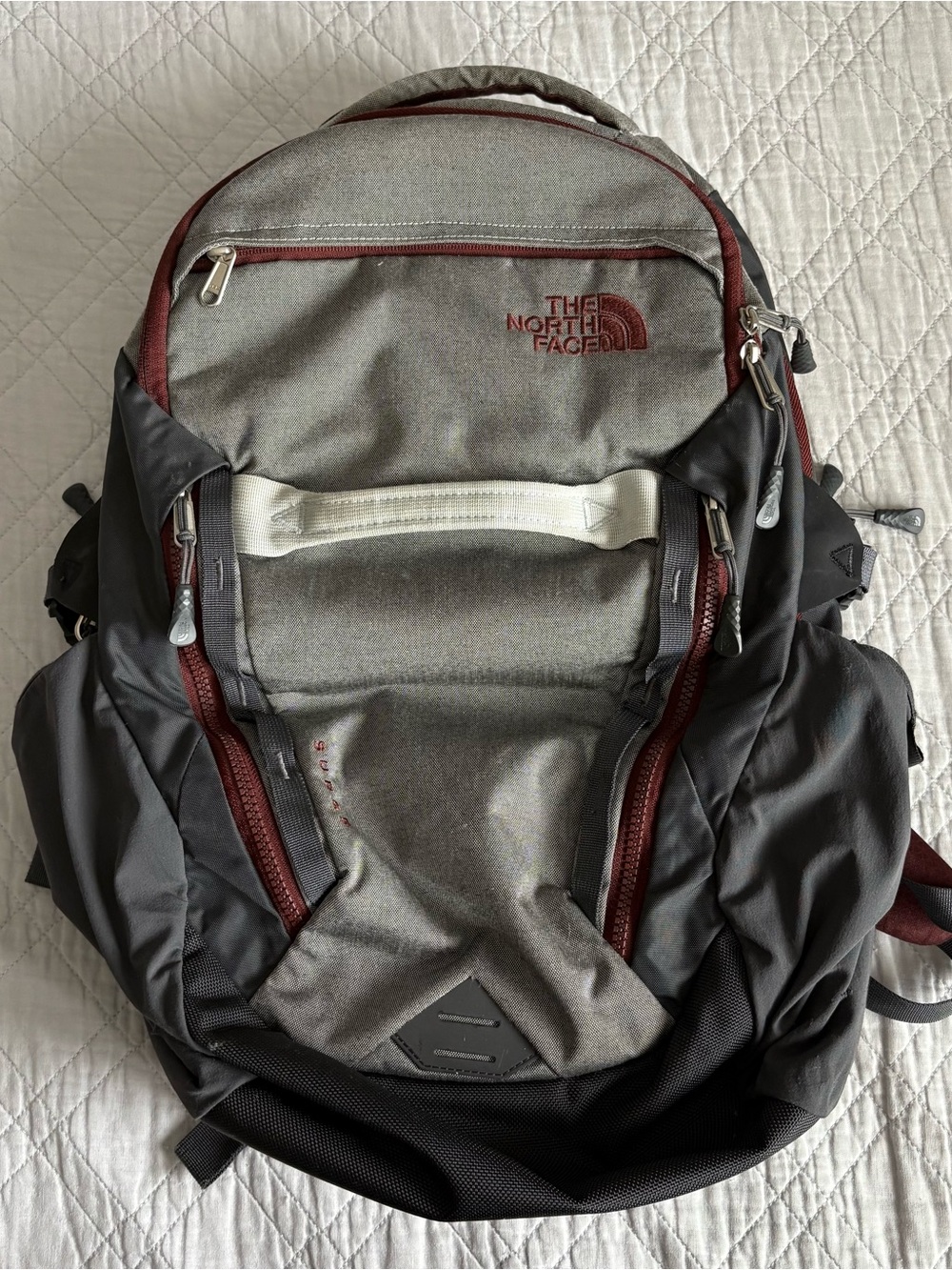 The North Face Surge Men's Gray and Maroon Backpack